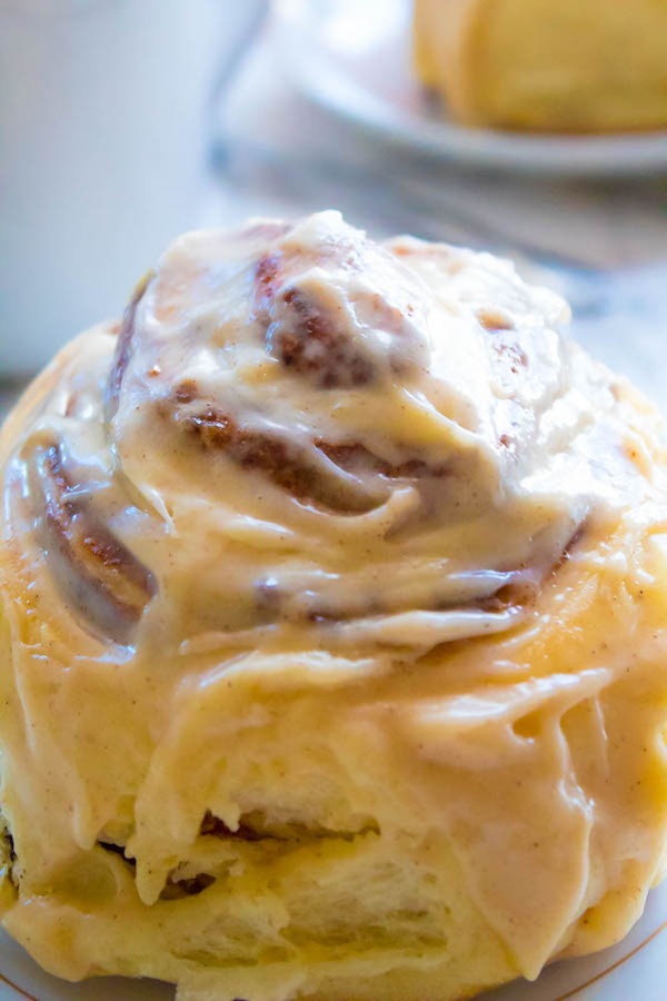 These are hands down the best Cinnamon Rolls I've ever had! They're incredibly soft, fluffy, warm and gooey. Smothered in a silky smooth Cinnamon Cream Cheese Icing, this will undoubtedly be your new favourite cinnamon roll recipe!