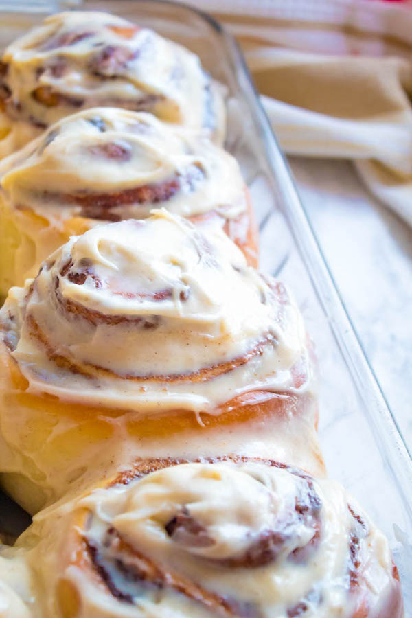 These are hands down the best Cinnamon Rolls I've ever had! They're incredibly soft, fluffy, warm and gooey. Smothered in a silky smooth Cinnamon Cream Cheese Icing, this will undoubtedly be your new favourite cinnamon roll recipe!