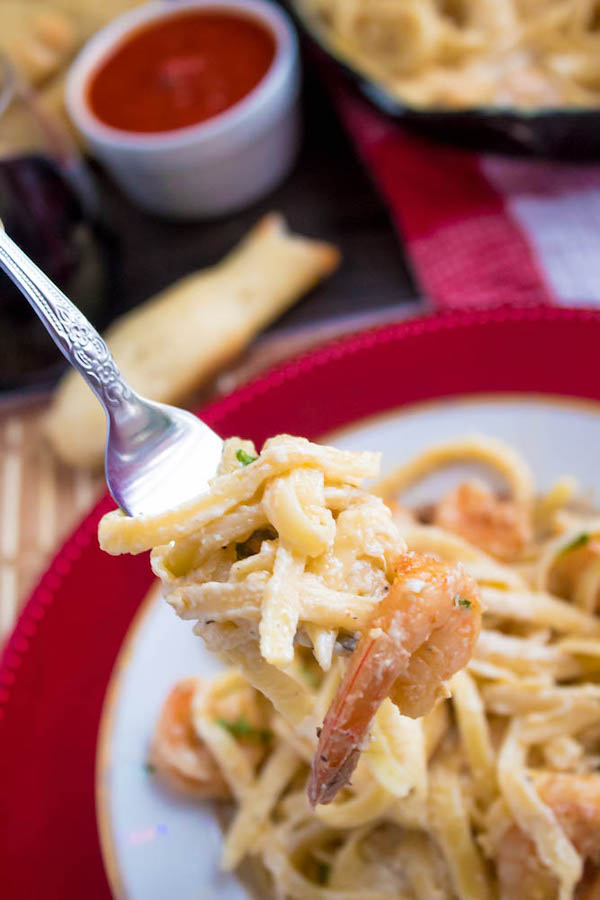 This Cajun Shrimp Fettuccine Alfredo is creamy and full of spicy Cajun flavour. Serve with a side of breadsticks for an easy and delicious pasta dinner!