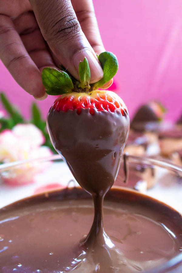 These Mini Chocolate Covered Strawberry Cheesecakes are made with a creamy bite-sized strawberry cheesecake and juicy chocolate covered strawberries. These are the perfect treats to finish off a romantic Valentine's Day dinner!