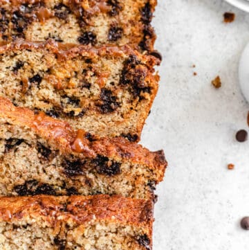 close up of multiple slices of banana bread lined up on each other