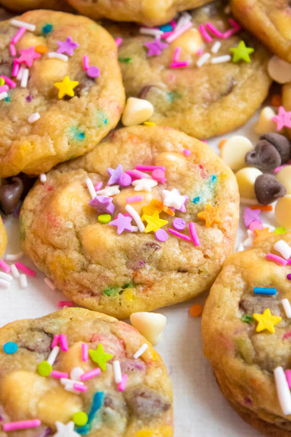 These Funfetti Chocolate Chip Cookies are perfectly soft and chewy. Loaded with two kinds of chocolate chips and rainbow sprinkles — these are the perfect cookies for a celebration!