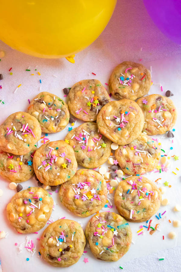 These Funfetti Chocolate Chip Cookies are perfectly soft and chewy. Loaded with two kinds of chocolate chips and rainbow sprinkles — these are the perfect cookies for a celebration!