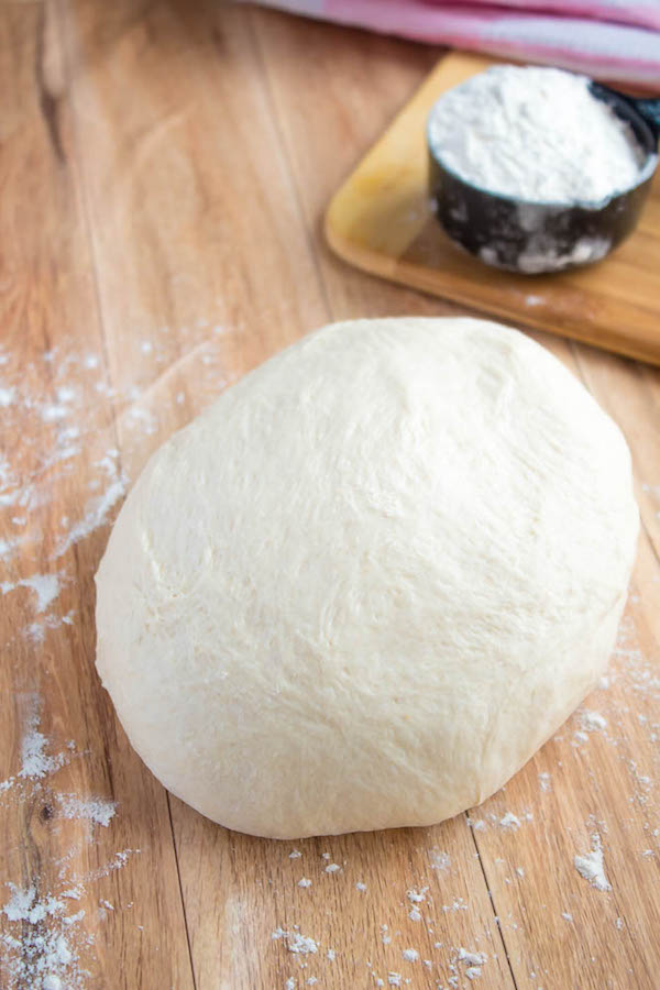 This Homemade Pizza Dough is super quick and easy to make. It's the perfect base for all your pizza creations!