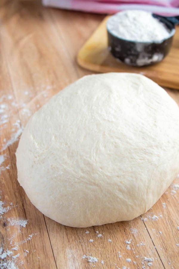 This Homemade Pizza Dough is super quick and easy to make. It's the perfect base for all your pizza creations!