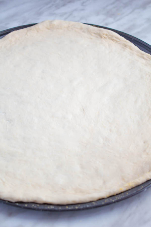 This Homemade Pizza Dough is super quick and easy to make. It's the perfect base for all your pizza creations!