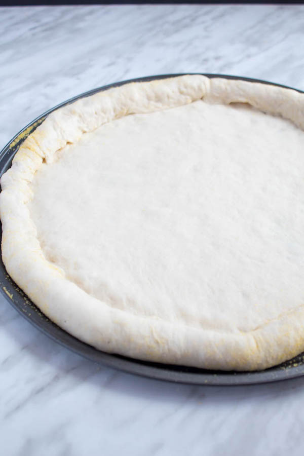 This Homemade Pizza Dough is super quick and easy to make. It's the perfect base for all your pizza creations!