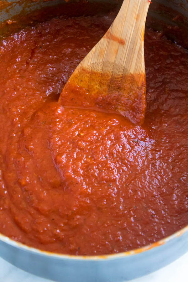 This Homemade Pizza Sauce is the perfect addition to your homemade pizza. Easy to make and packed with flavour — once you make this sauce, you'll never resort to store bought again!