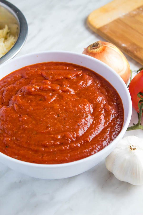 This Homemade Pizza Sauce is the perfect addition to your homemade pizza. Easy to make and packed with flavour — once you make this sauce, you'll never resort to store bought again!