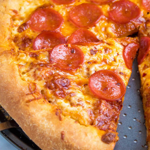 Pizza Night just got a whole lot better! This Homemade Pizza is topped with a flavourful sauce, two types of cheeses and slices of pepperoni. What makes this classic pepperoni pizza so special? The crust is stuffed with cheese!