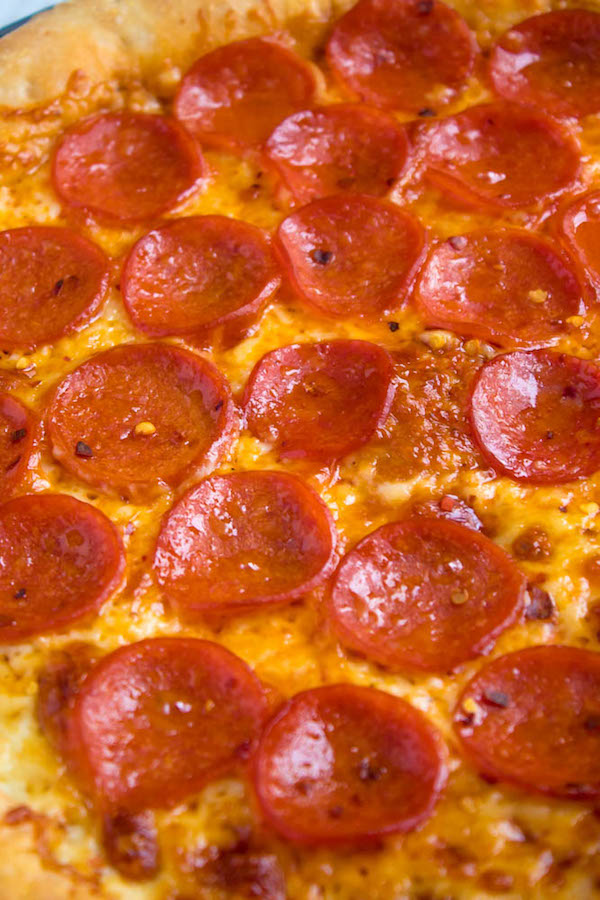 Pizza Night just got a whole lot better! This Homemade Pizza is topped with a flavourful sauce, two types of cheeses and slices of pepperoni. What makes this classic pepperoni pizza so special? The crust is stuffed with cheese!