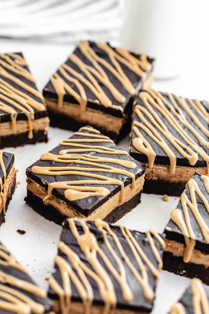 peanut butter flavoured brownies with a drizzle of melted peanut butter