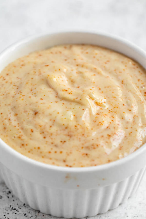 close up of aioli mayonnaise in a white ramekin