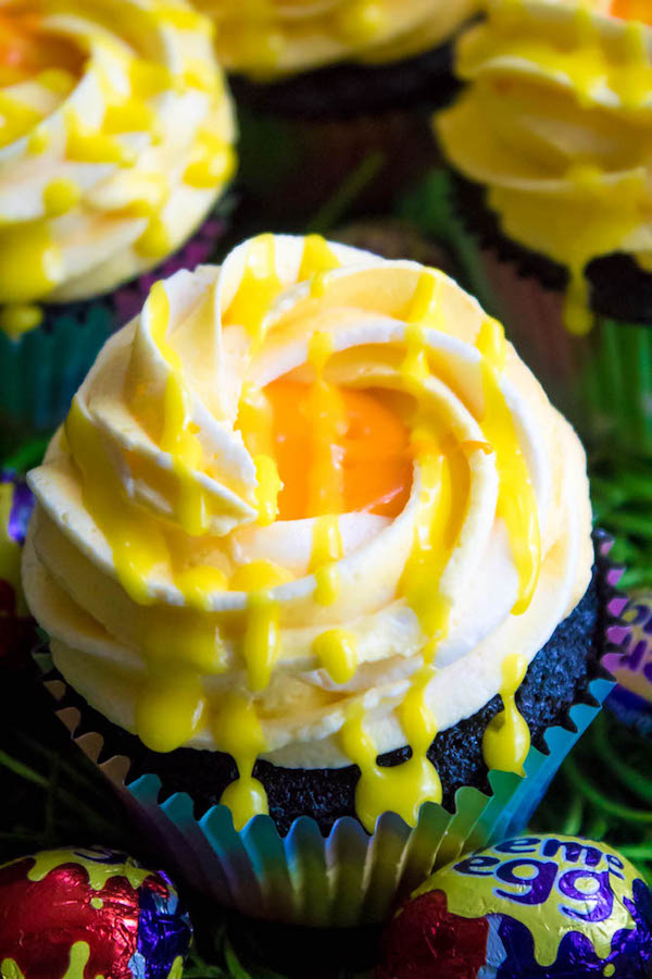 If you're a fan of Cadbury Creme Eggs, you're gonna fall in love with these Cadbury Creme Egg Cupcakes! These cupcakes are decadent, sweet, ooey and gooey. This is the perfect dessert for Easter!