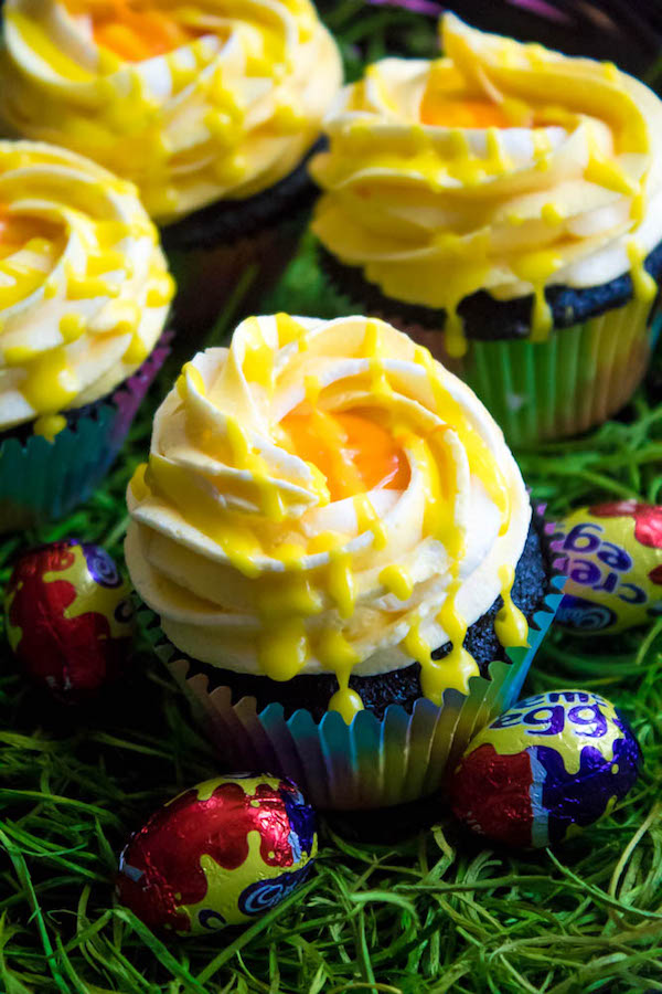 If you're a fan of Cadbury Creme Eggs, you're gonna fall in love with these Cadbury Creme Egg Cupcakes! These cupcakes are decadent, sweet, ooey and gooey. This is the perfect dessert for Easter!