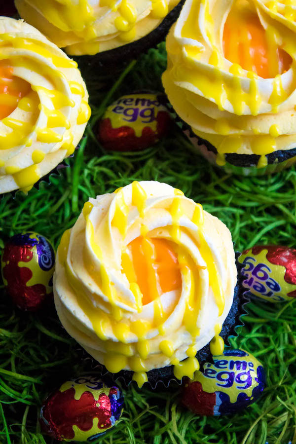 If you're a fan of Cadbury Creme Eggs, you're gonna fall in love with these Cadbury Creme Egg Cupcakes! These cupcakes are decadent, sweet, ooey and gooey. This is the perfect dessert for Easter!