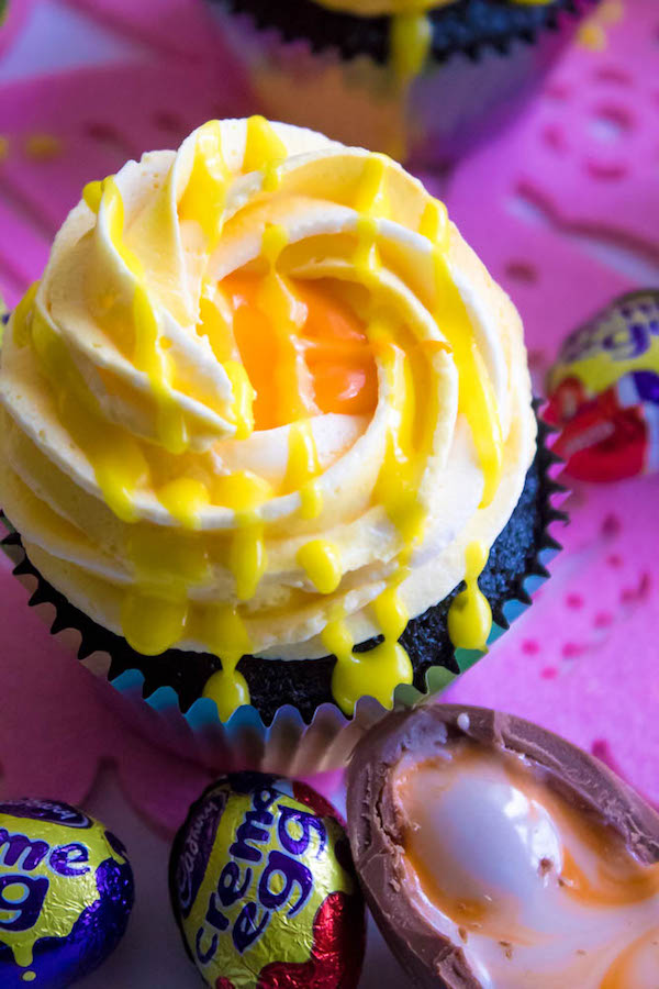 If you're a fan of Cadbury Creme Eggs, you're gonna fall in love with these Cadbury Creme Egg Cupcakes! These cupcakes are decadent, sweet, ooey and gooey. This is the perfect dessert for Easter!