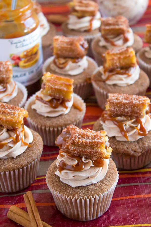 Take your favourite cinnamon/sugar treat and turn it into cupcakes! These Dulce de Leche Churro Cupcakes are a must for Cinco de Mayo! Soft and fluffy cinnamon cupcakes, filled with gooey dulce de leche, dipped in cinnamon sugar, topped with cinnamon buttercream and a dulce de leche filled churro!