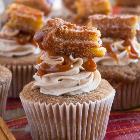 Take your favourite cinnamon/sugar treat and turn it into cupcakes! These Dulce de Leche Churro Cupcakes are a must for Cinco de Mayo! Soft and fluffy cinnamon cupcakes, filled with gooey dulce de leche, dipped in cinnamon sugar, topped with cinnamon buttercream and a dulce de leche filled churro!