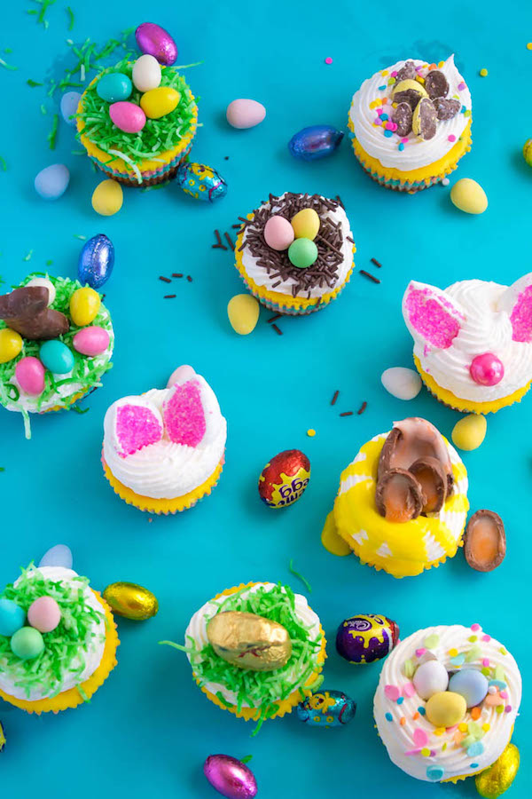 These Mini Easter Cheesecakes are a colourful, fun, festive Easter and Spring treat! Creamy, pastel layered mini cheesecakes topped with yummy Easter candy!