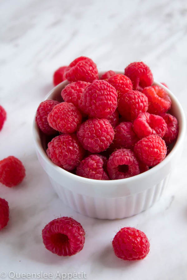 This Homemade Raspberry Sauce is perfect for filling cakes and topping waffles, pancakes, scones, cheesecake and so much more! 