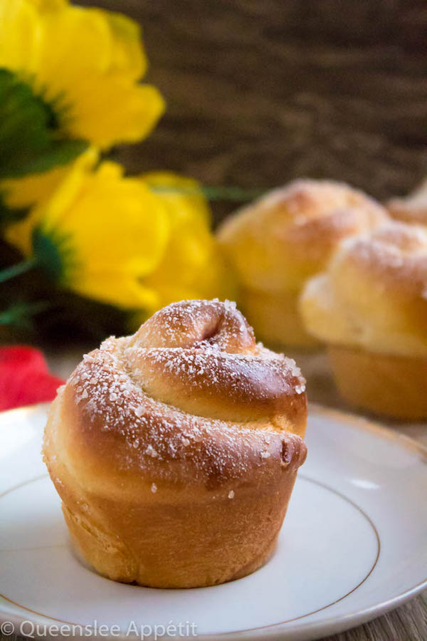 Wake up and smell the rose buns! Soft and fluffy rose-shaped buns filled with sweet raspberry jam. These Raspberry Rose Buns are an easy and gorgeous gift for Mothers Day! 