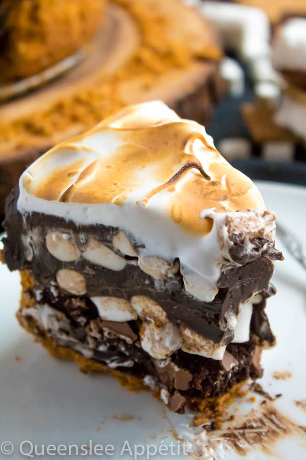 Mississippi Mud Pie with a S’mores twist! This decadent S’mores Mississippi Mud Pie combines the classic campfire treat with a traditional Mississippi Mud pie. With a buttery graham cracker crust, fudgy brownie base, thick and rich dark chocolate pudding with marshmallows mixed in, then topped off with a fluffy toasted meringue — this summer dessert is to die for! 