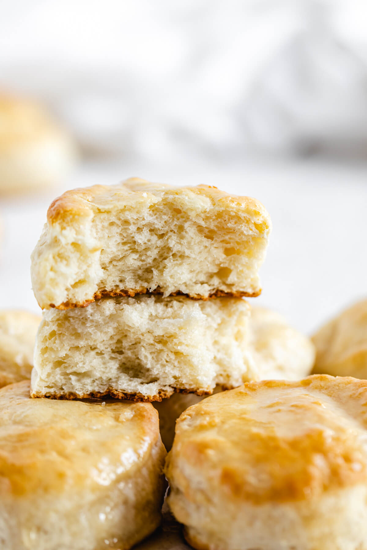 halved biscuits on top of whole biscuits