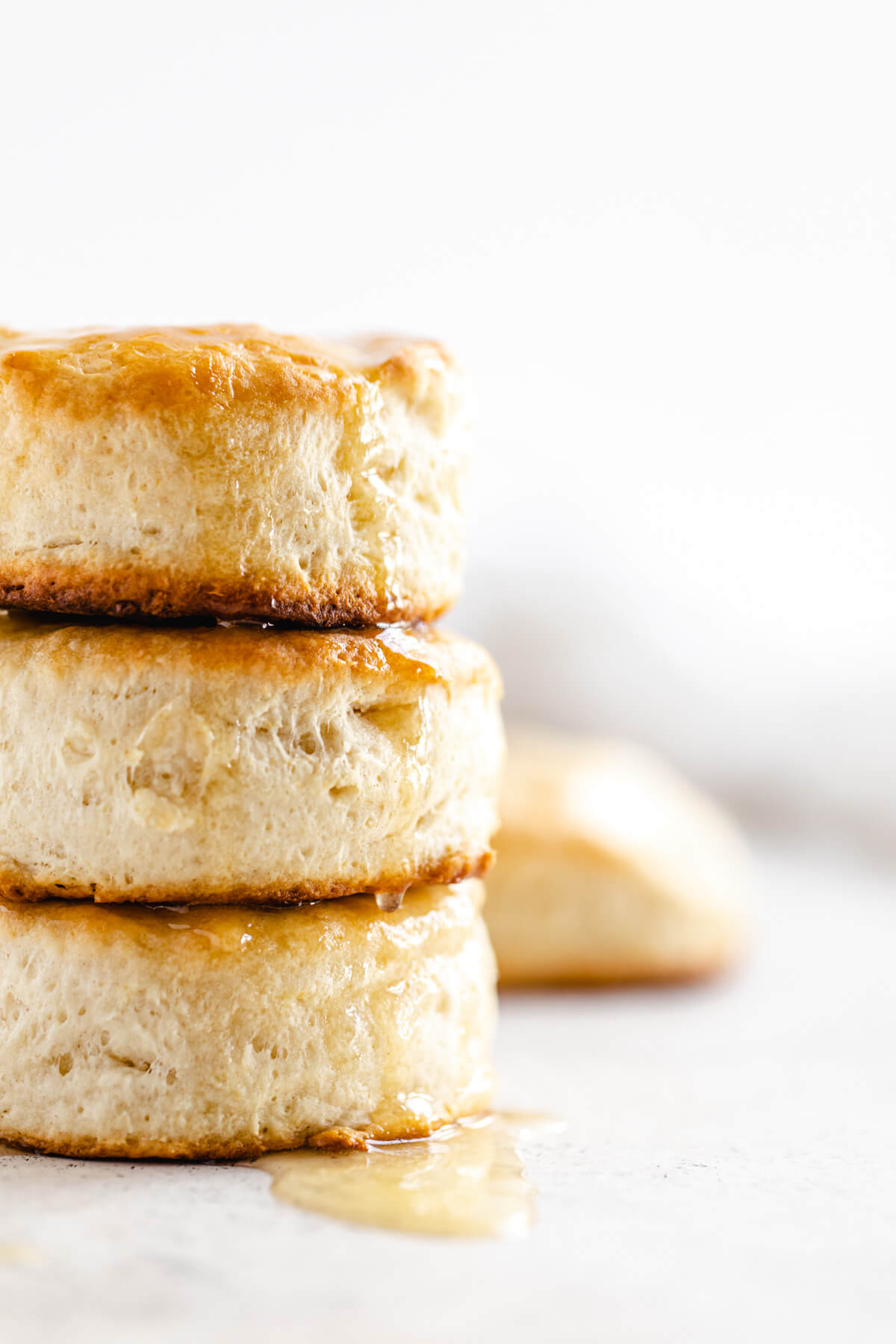 close up showing half of a stack of three biscuits