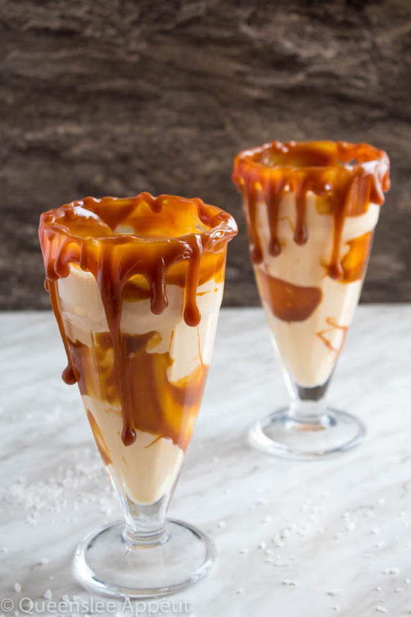 This Salted Caramel Milkshake is made with creamy vanilla ice cream and homemade salted caramel sauce. Topped with fluffy whipped cream, extra salted caramel sauce and toffee bits — this is the perfect chilly drink to indulge in this summer! 