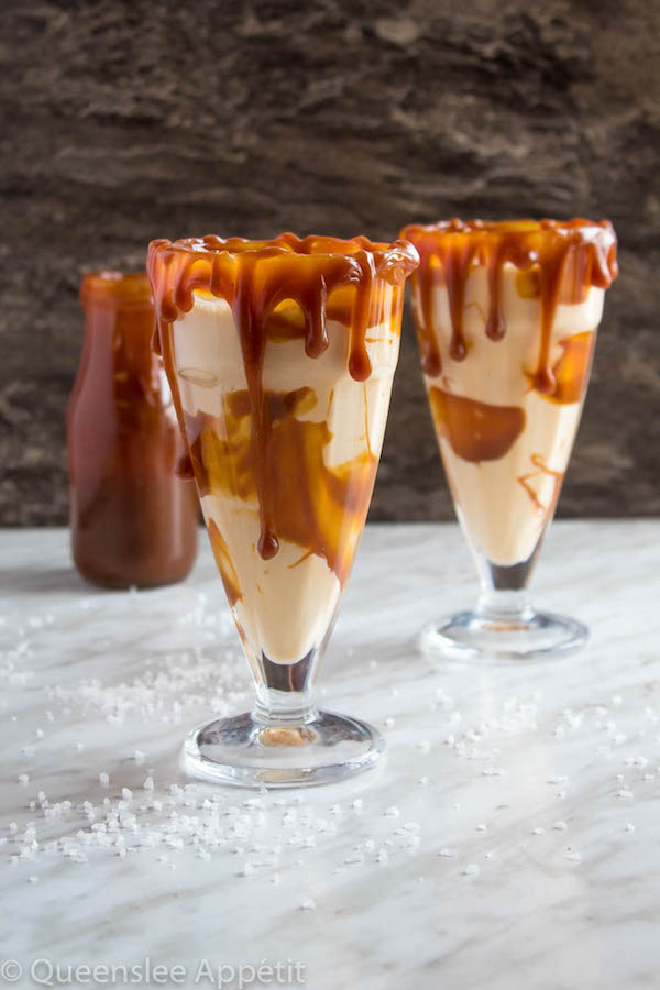 This Salted Caramel Milkshake is made with creamy vanilla ice cream and homemade salted caramel sauce. Topped with fluffy whipped cream, extra salted caramel sauce and toffee bits — this is the perfect chilly drink to indulge in this summer! 