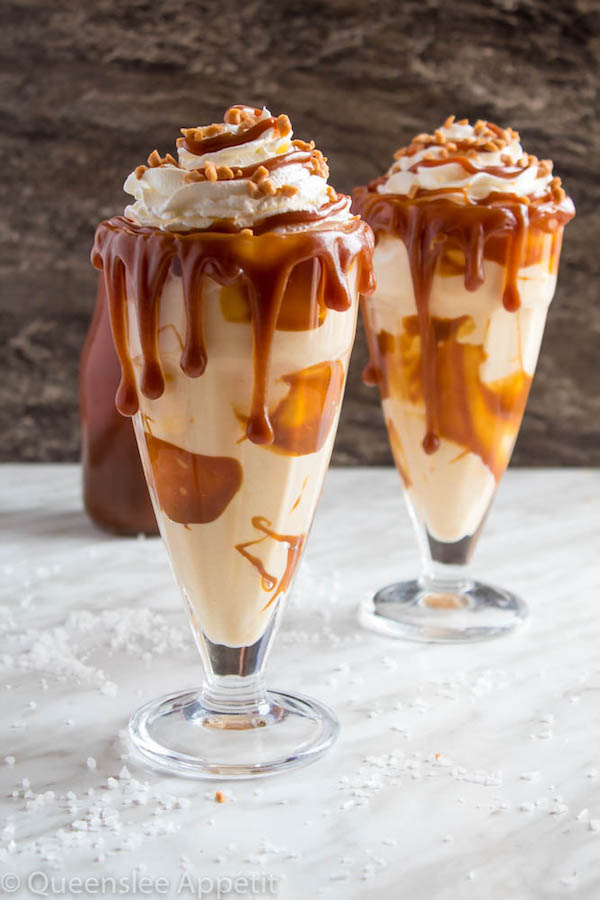 This Salted Caramel Milkshake is made with creamy vanilla ice cream and homemade salted caramel sauce. Topped with fluffy whipped cream, extra salted caramel sauce and toffee bits — this is the perfect chilly drink to indulge in this summer! 