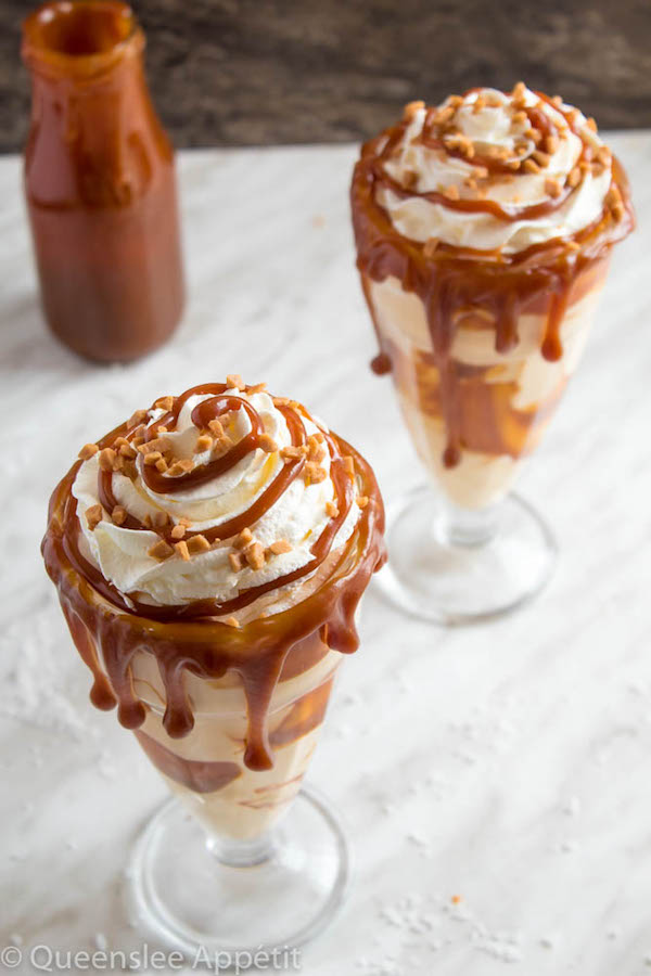 This Salted Caramel Milkshake is made with creamy vanilla ice cream and homemade salted caramel sauce. Topped with fluffy whipped cream, extra salted caramel sauce and toffee bits — this is the perfect chilly drink to indulge in this summer! 