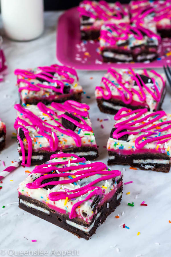 These Birthday Cake Oreo Fudge Brownies are super rich and decadent. Layers of fudgy Birthday Cake Oreo stuffed brownies and Funfetti fudge are topped with more Oreos and plenty of sprinkles. Drizzle these bars with hot pink candy melts and you’ve got a party in a brownie!