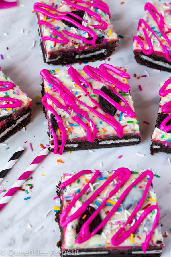 These Birthday Cake Oreo Fudge Brownies are super rich and decadent. Layers of fudgy Birthday Cake Oreo stuffed brownies and Funfetti fudge are topped with more Oreos and plenty of sprinkles. Drizzle these bars with hot pink candy melts and you’ve got a party in a brownie!