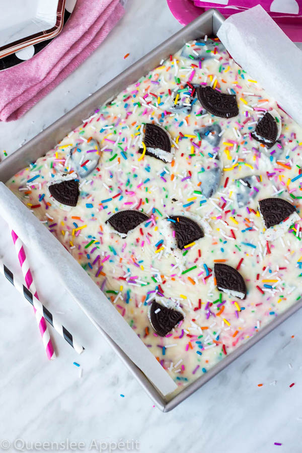 These Birthday Cake Oreo Fudge Brownies are super rich and decadent. Layers of fudgy Birthday Cake Oreo stuffed brownies and Funfetti fudge are topped with more Oreos and plenty of sprinkles. Drizzle these bars with hot pink candy melts and you’ve got a party in a brownie!