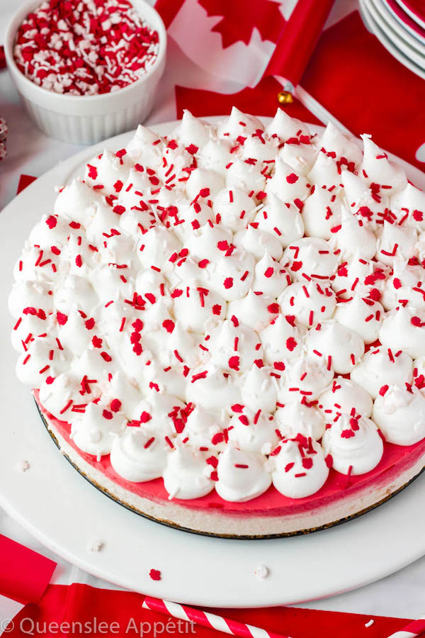 This No-Bake Canada Day Cheesecake is an unbelievably easy dessert that takes absolutely no time or effort to make! The red and white layers, cool whip topping and red and white sprinkles makes this the perfect dessert for Canada Day! 