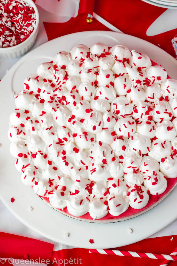 This No-Bake Canada Day Cheesecake is an unbelievably easy dessert that takes absolutely no time or effort to make! The red and white layers, cool whip topping and red and white sprinkles makes this the perfect dessert for Canada Day! 