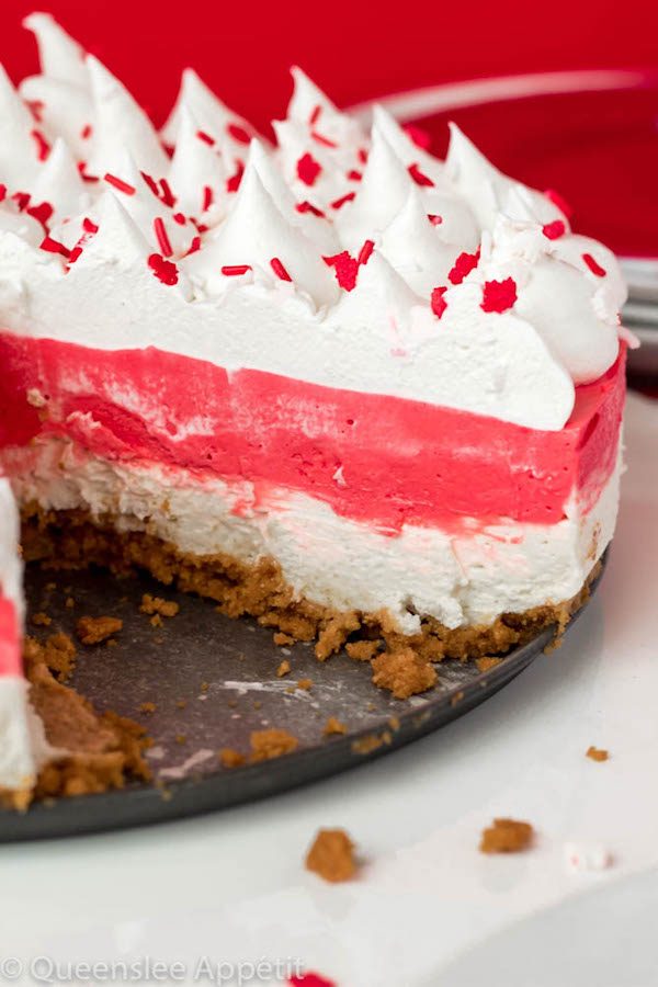 This No-Bake Canada Day Cheesecake is an unbelievably easy dessert that takes absolutely no time or effort to make! The red and white layers, cool whip topping and red and white sprinkles makes this the perfect dessert for Canada Day! 