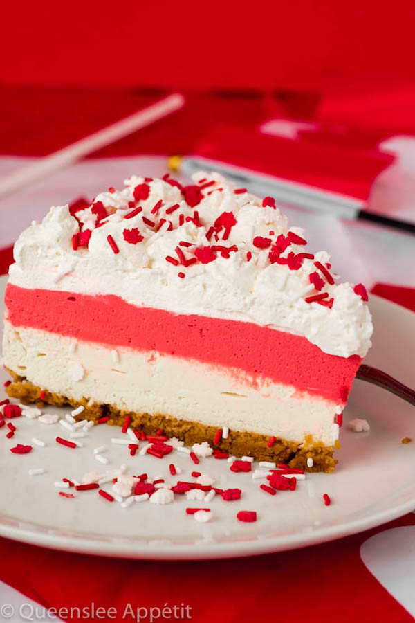 This No-Bake Canada Day Cheesecake is an unbelievably easy dessert that takes absolutely no time or effort to make! The red and white layers, cool whip topping and red and white sprinkles makes this the perfect dessert for Canada Day! 