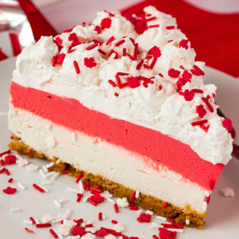 This No-Bake Canada Day Cheesecake is an unbelievably easy dessert that takes absolutely no time or effort to make! The red and white layers, cool whip topping and red and white sprinkles makes this the perfect dessert for Canada Day! 