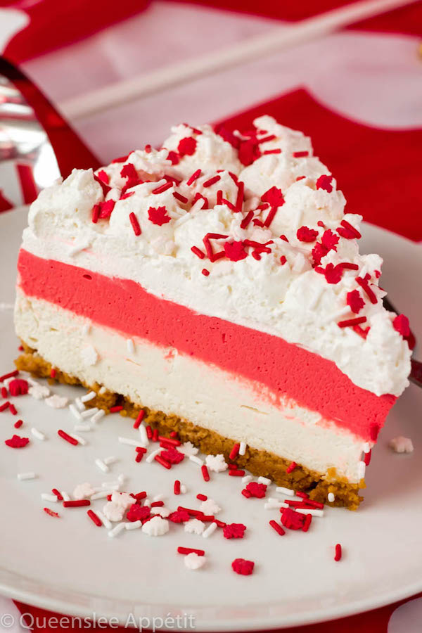 This No-Bake Canada Day Cheesecake is an unbelievably easy dessert that takes absolutely no time or effort to make! The red and white layers, cool whip topping and red and white sprinkles makes this the perfect dessert for Canada Day! 