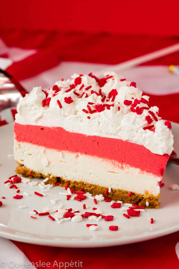 This No-Bake Canada Day Cheesecake is an unbelievably easy dessert that takes absolutely no time or effort to make! The red and white layers, cool whip topping and red and white sprinkles makes this the perfect dessert for Canada Day! 