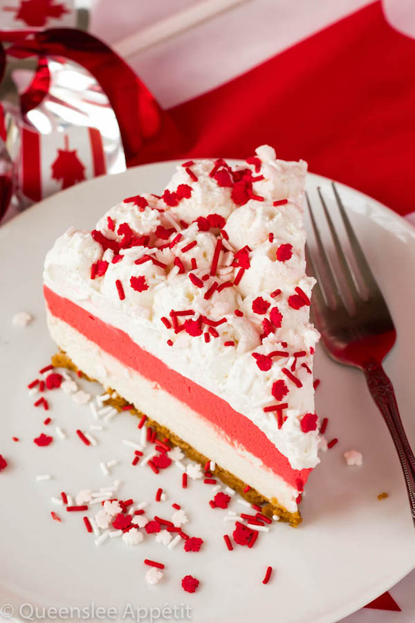 This No-Bake Canada Day Cheesecake is an unbelievably easy dessert that takes absolutely no time or effort to make! The red and white layers, cool whip topping and red and white sprinkles makes this the perfect dessert for Canada Day! 