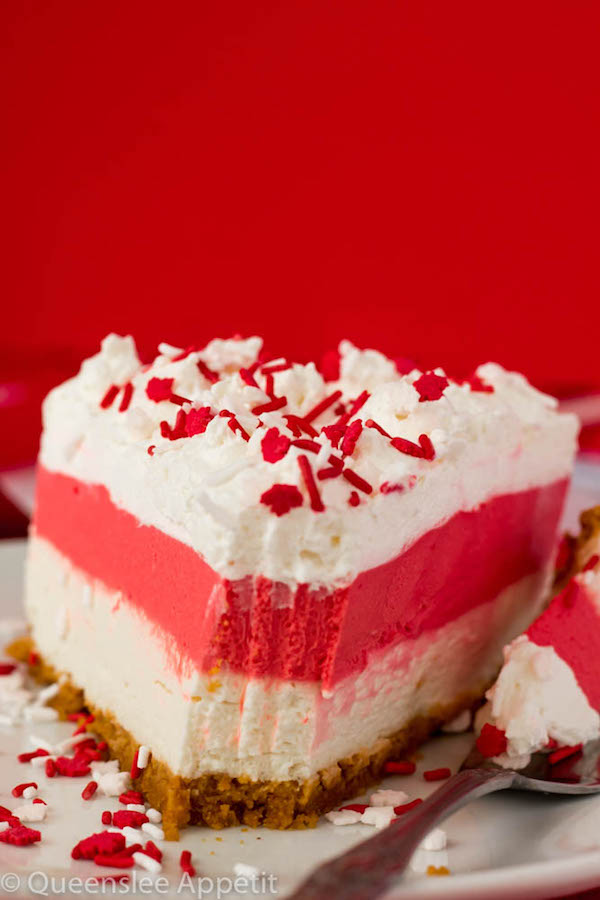 This No-Bake Canada Day Cheesecake is an unbelievably easy dessert that takes absolutely no time or effort to make! The red and white layers, cool whip topping and red and white sprinkles makes this the perfect dessert for Canada Day! 