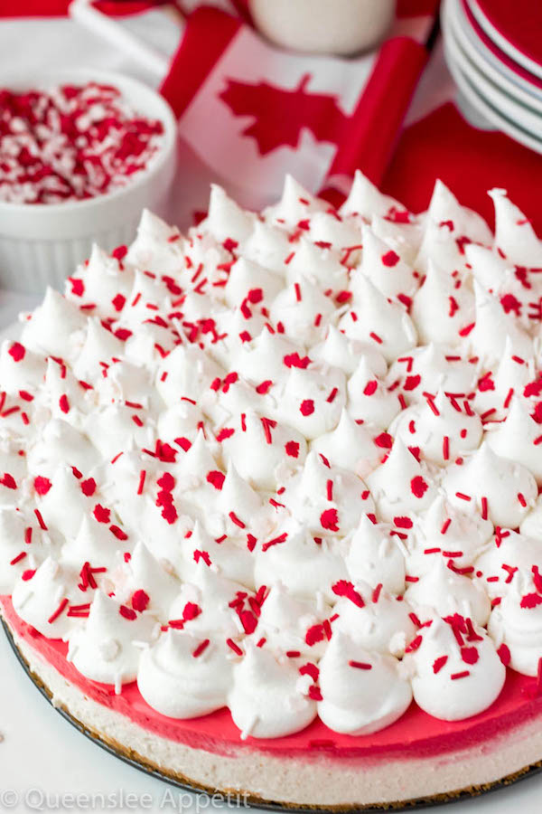 This No-Bake Canada Day Cheesecake is an unbelievably easy dessert that takes absolutely no time or effort to make! The red and white layers, cool whip topping and red and white sprinkles makes this the perfect dessert for Canada Day! 