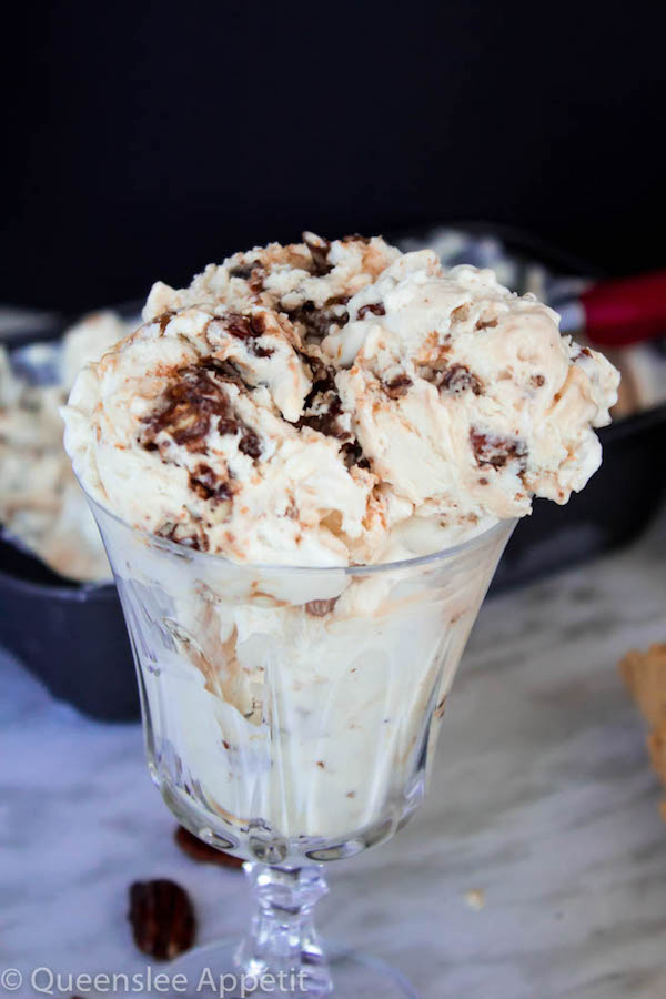 This No-Churn Candied Pecan Caramel Swirl Ice Cream starts with a simple creamy vanilla ice cream. Mix in chunks of crunchy, sweet candied pecan pieces and swirl in a ribbon of silky homemade caramel sauce for a super easy summer treat! 