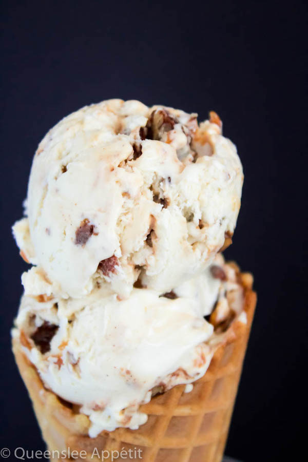 This No-Churn Candied Pecan Caramel Swirl Ice Cream starts with a simple creamy vanilla ice cream. Mix in chunks of crunchy, sweet candied pecan pieces and swirl in a ribbon of silky homemade caramel sauce for a super easy summer treat! 