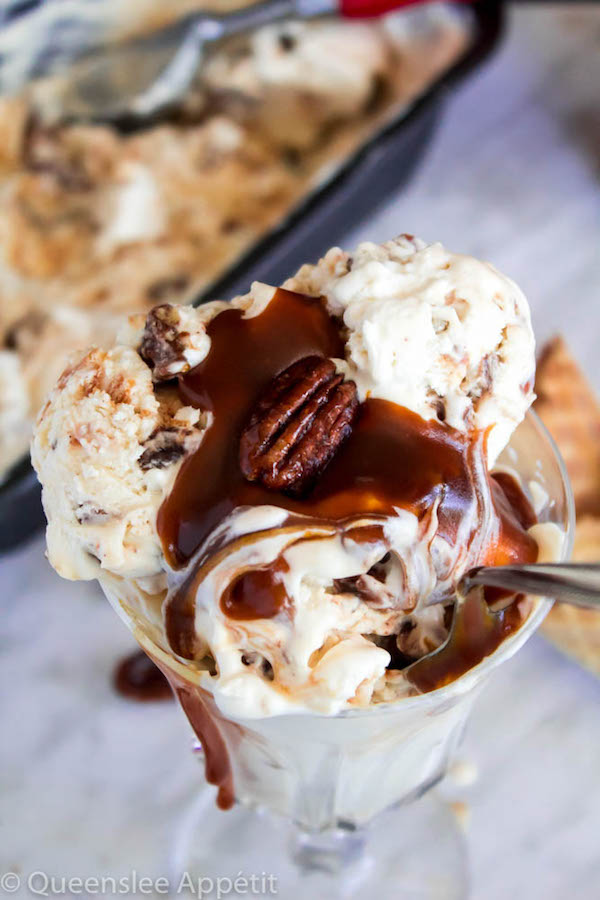 This No-Churn Candied Pecan Caramel Swirl Ice Cream starts with a simple creamy vanilla ice cream. Mix in chunks of crunchy, sweet candied pecan pieces and swirl in a ribbon of silky homemade caramel sauce for a super easy summer treat! 