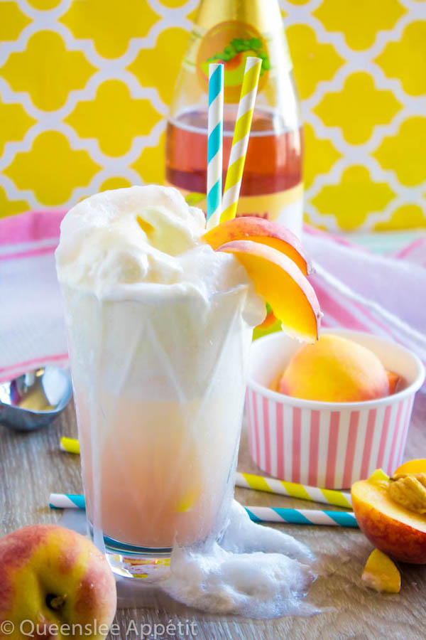 These Peaches and Cream Floats are a super delicious and refreshing drink. Scoops of creamy vanilla ice cream topped with a sparkling peach beverage and club soda. This fizzy drink is perfect for a hot summer day!  